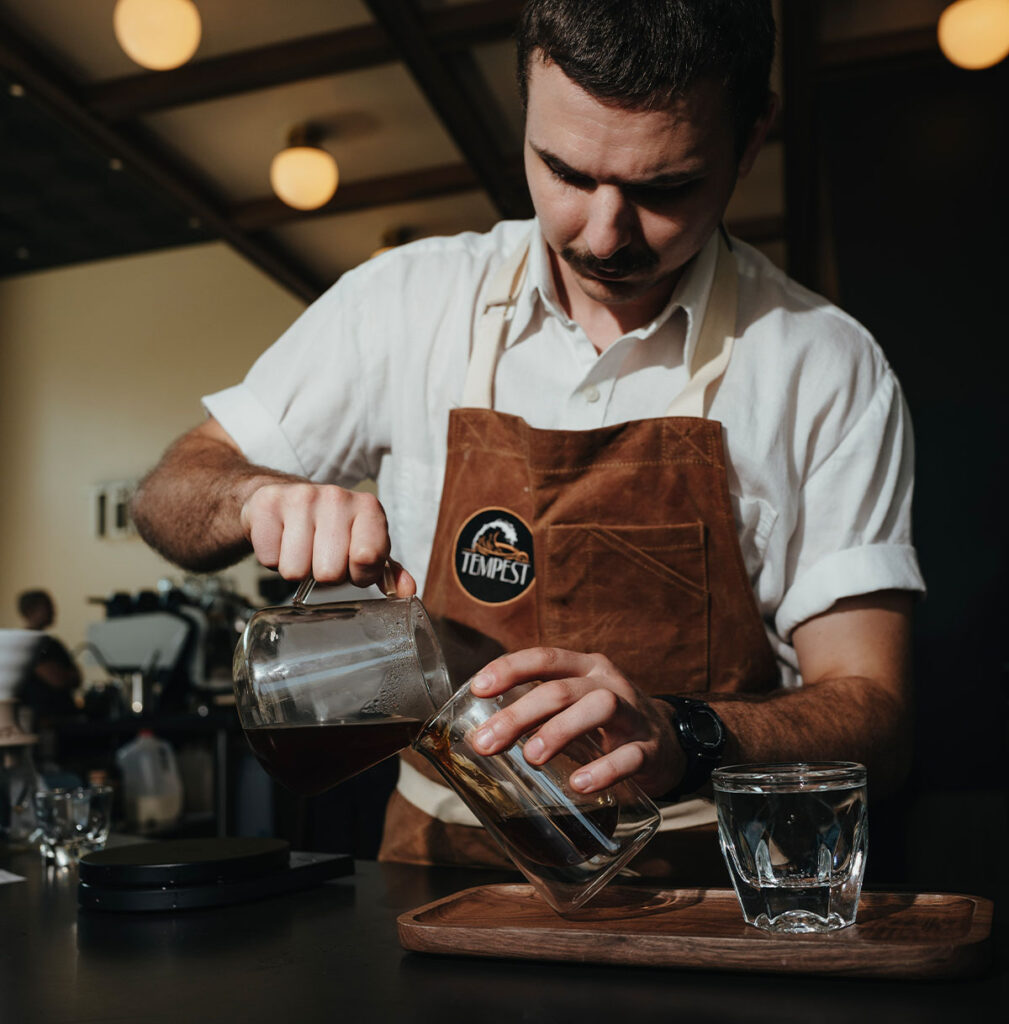 Barista working the espresso bar at Tempest