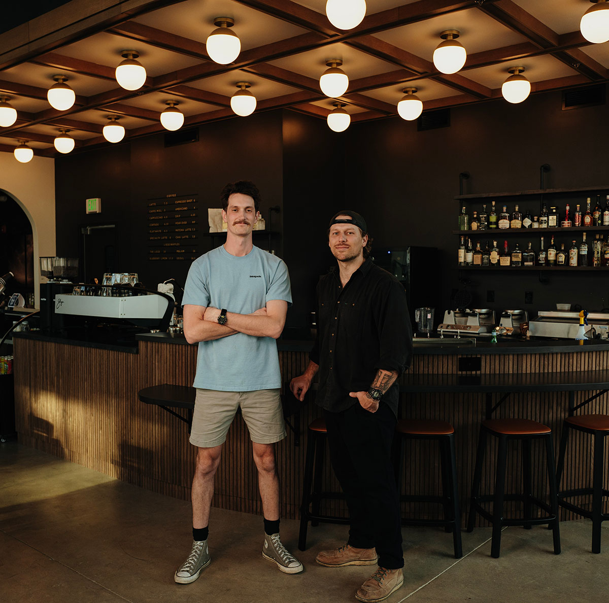 Tempest co-owners Park and Jonah standing at the coffee bar